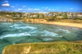 Surf and waves and beach Mawgan Porth Cornwall England near Newquay and south of Porthcothan and Treyarnon HDR Royalty Free Stock Photo