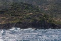 Surf waves hit shores of the island