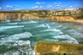 Surf and waves Mawgan Porth north Cornwall England near Newquay and south of Porthcothan and Treyarnon HDR Royalty Free Stock Photo