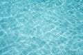 Surface of blue and bright water in swimming pool Royalty Free Stock Photo