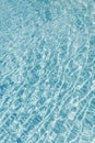 Surface of blue shining swimming pool water ripple. Royalty Free Stock Photo