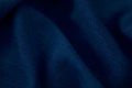 the surface of a blue silk fabric on a white background Royalty Free Stock Photo