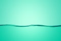 The surface of calm water in turquoise color. Close-up