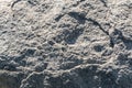 Surface of the cave rock wall, gray stone texture background Royalty Free Stock Photo