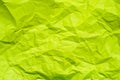 surface of crumpled blank bright green for background