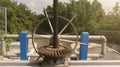 The surface of a gear wheel in a dam`s water discharge regulator machine