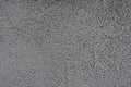 Surface of grainy gray wall front view Royalty Free Stock Photo