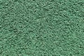 Surface green stone floor of artificial synthetic texture.