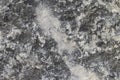 Surface grey granite stone with light lines and streaks Royalty Free Stock Photo