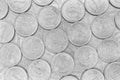 Surface of Japanese 1 one yen coins. Scratched money out of circulation. Close-up. Light monochrome black and white background or Royalty Free Stock Photo