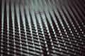 Surface of latticed metal fence. Stainless steel and aluminum light blur background. Macro texture