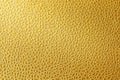 Surface of leatherette gold color textured background