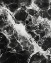 The surface is made of honed black soapstone and features delicate natural marbling Royalty Free Stock Photo