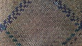 surface of mat that weaved using reed.