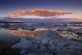 Surface of Mono lake in California with reflection of a cloudy sunset Royalty Free Stock Photo