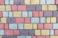 Surface of multi-colored paving slabs. Beautiful pattern, background close-up Royalty Free Stock Photo