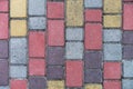 Surface of multi-colored paving slabs. Beautiful pattern, background close-up Royalty Free Stock Photo