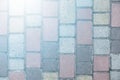 Surface of multi-colored paving slabs. Beautiful pattern, background close-up Royalty Free Stock Photo