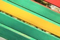 The surface of the nailed boards painted in green, yellow and red. Background picture Royalty Free Stock Photo