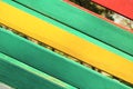 The surface of the nailed boards painted in green, yellow and red. Background picture Royalty Free Stock Photo