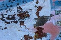 Surface of old rusty metal doors painted in various colors Royalty Free Stock Photo