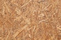 The surface of the oriented particle Board, pressed from a long strand.