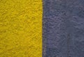 The surface is painted in half in yellow and black. Royalty Free Stock Photo