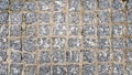 Surface paved with black road tiles. top view. Granite paving stones on a sidewalk or pavement textured paving background. Close