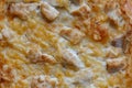 Surface of a pie with meat and cheese, food texture Royalty Free Stock Photo