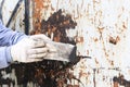 Surface preparation by trowel for remove old paint Royalty Free Stock Photo
