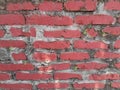 The surface of a red brick wall without a smooth cement layer Royalty Free Stock Photo