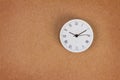 Surface of roman number clock on brown paper background