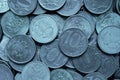 A surface of Russian coins of 10 rubles. Blue tinted background. Economy and the Central Bank of Russia. Money textured wallpaper