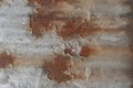 Surface of rusty iron with remnants of old paint, chipped paint, grey texture, background Royalty Free Stock Photo