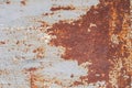 Surface of rusty iron with remnants of old paint, chipped paint, texture background Royalty Free Stock Photo