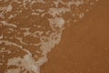 The surface of the sea on the sand, waves on the beach a Royalty Free Stock Photo