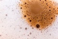 Surface texture of hot milk coffee and soft froth Royalty Free Stock Photo