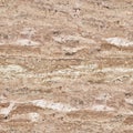 Surface of travertine stone in close-up. Abstract texture. Seaml Royalty Free Stock Photo