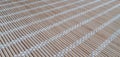 Surface of wooden mat. Asian style bamboo weave rug. Background bamboo sticks with thread uniting. Royalty Free Stock Photo