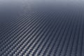 Surface of a woven carbon fibre sheet Royalty Free Stock Photo