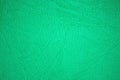 The surface of wrinkled and crumpled natural leather painted in bright green Royalty Free Stock Photo