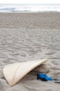 Surfboard on empty beach