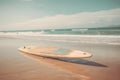 Surfboard on long sandy deserted ocean beach Royalty Free Stock Photo