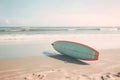 Surfboard on long sandy deserted ocean beach Royalty Free Stock Photo