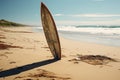 Surfboard rests on a pristine, untouched beach, free and tranquil