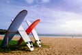 Surfboards available for rent on the beach. Royalty Free Stock Photo