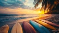 surfboards lined up on a beach at sunset, evoking a laid-back, Royalty Free Stock Photo