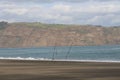 Surfcasting rods left at the beach