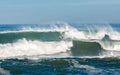 Surfer in a barrel falling under the force of the waves