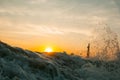 Surfer against the backdrop of the setting sun Royalty Free Stock Photo